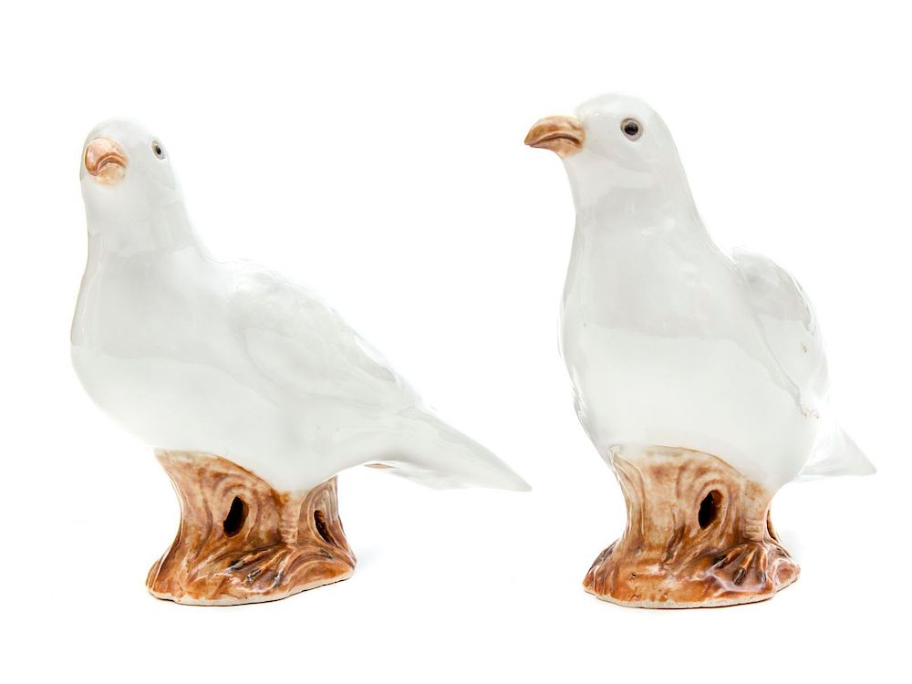 Appraisal: A Pair of Chinese Porcelain Figures of Doves Height x