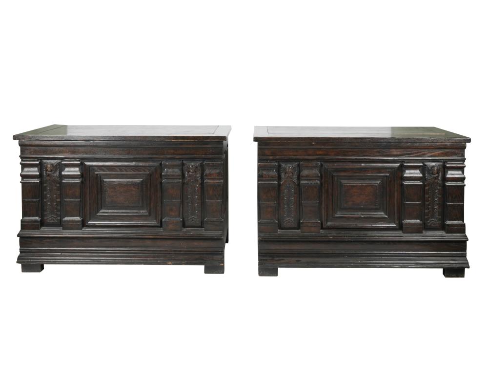 Appraisal: PAIR OF CARVED OAK CHESTSwith hinged tops Condition hardware replaced