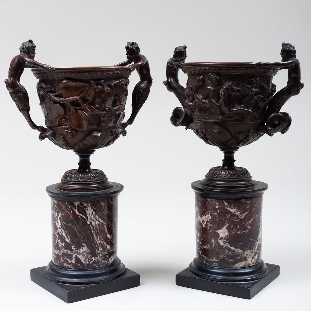 Appraisal: Pair of Bronze-Mounted Marble Urns with Figural Handles Each cast