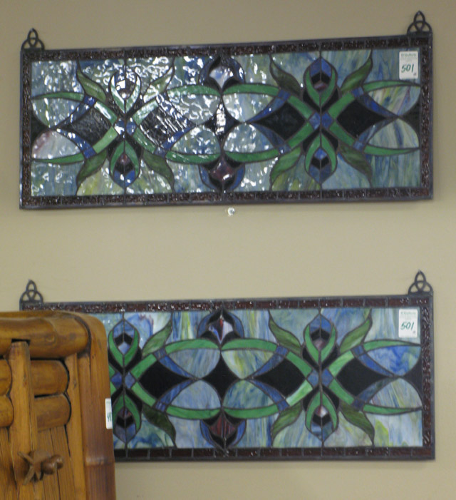 Appraisal: A MATCHING PAIR OF LEADED GLASS TRANSOM WINDOWS American Victorian