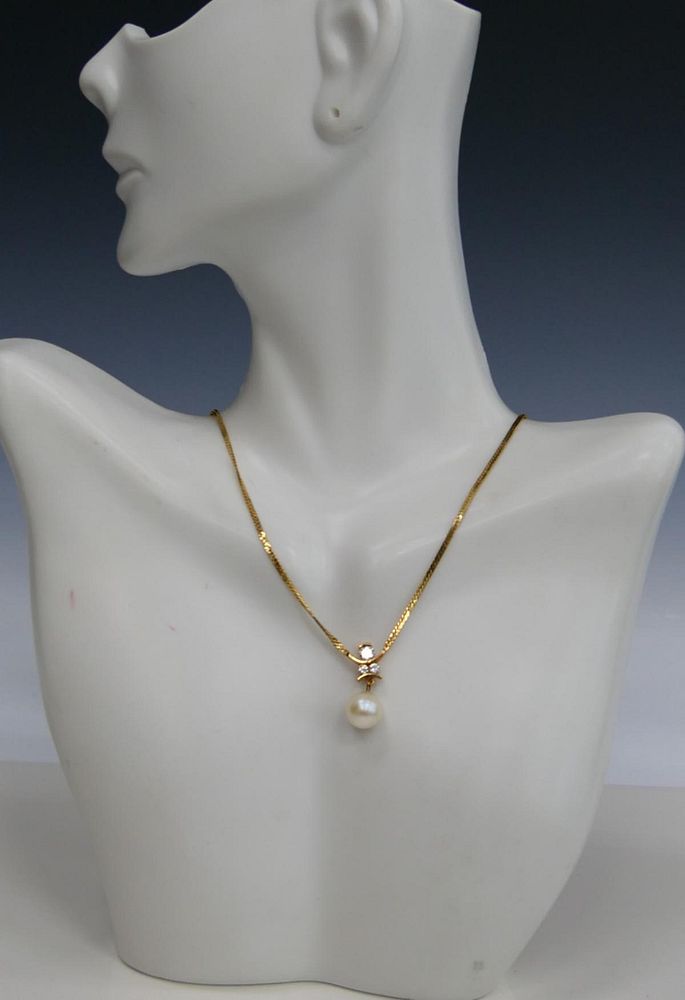 Appraisal: KT YELLOW GOLD PEARL AND DIAMOND NECKLACE KT gold necklace