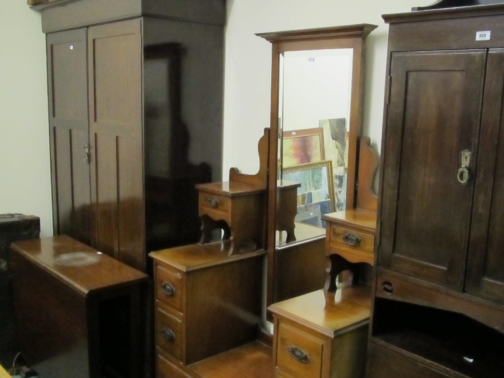 Appraisal: Victorian dressing chest wardrobe and wardrobe section and a drop