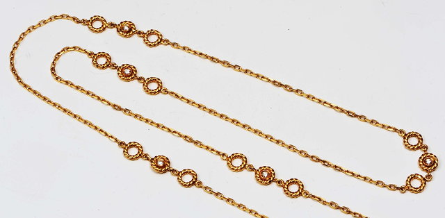 Appraisal: An ct gold necklaceof stylised form with diamond decoration