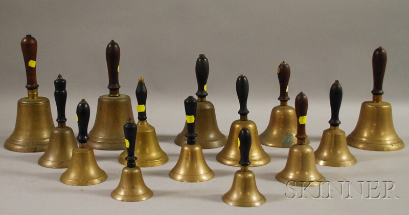 Appraisal: Fourteen Brass Hand Bells with Turned Wood Handles lg to