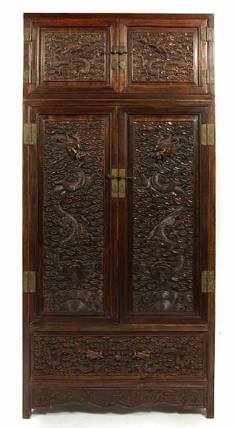 Appraisal: A pair of Chinese hardwood cupboards height ft in width