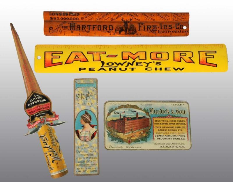 Appraisal: Lot of Tin Advertising Pieces Description Includes rulers and letter