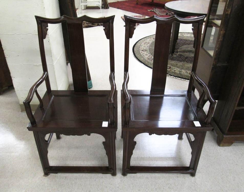 Appraisal: A PAIR OF CHINESE MING STYLE ARMCHAIRS Note Chinese wax