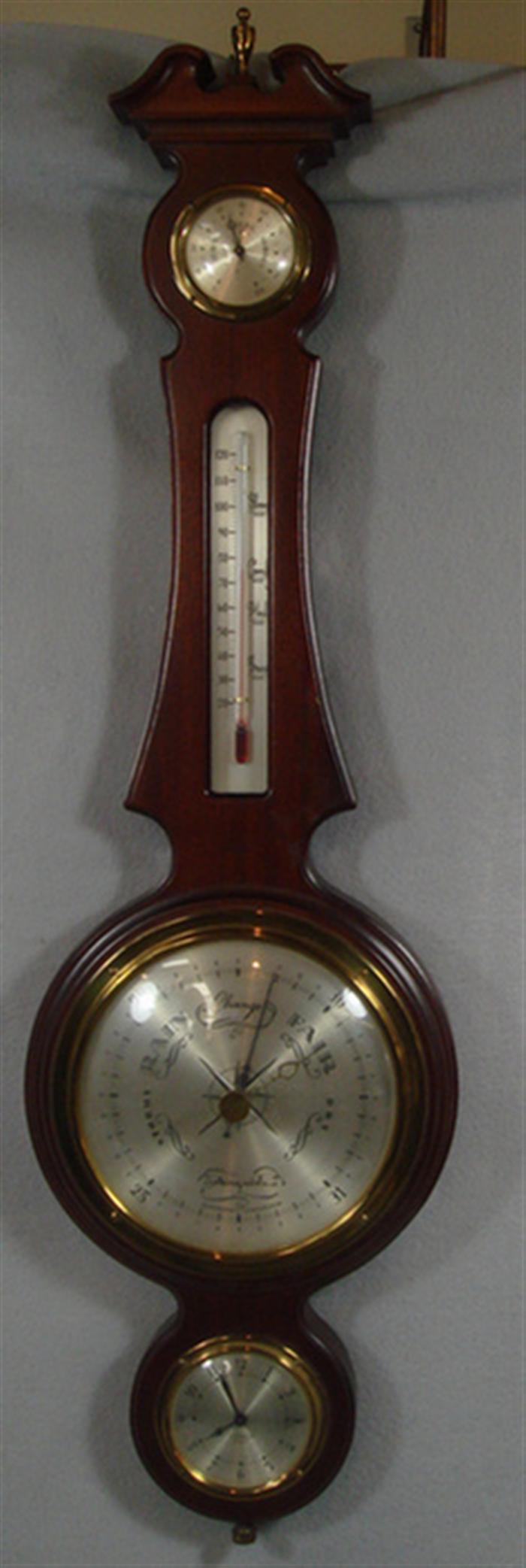 Appraisal: Airguide aneroid barometer with stem wind clock in base h