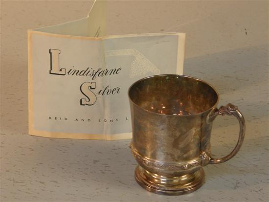 Appraisal: Modern Lindisfarne silver christening mug with a band of celtic