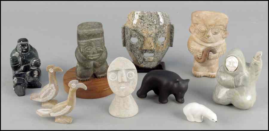 Appraisal: KAYUTAK INUIT CARVING Togethert with carvings and figures Condition No