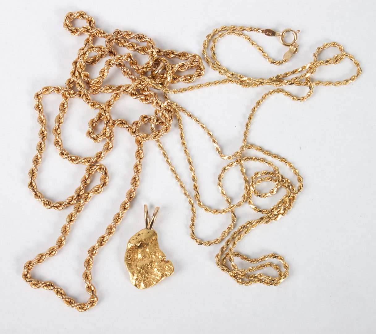 Appraisal: Two K gold rope chain necklaces in L and in