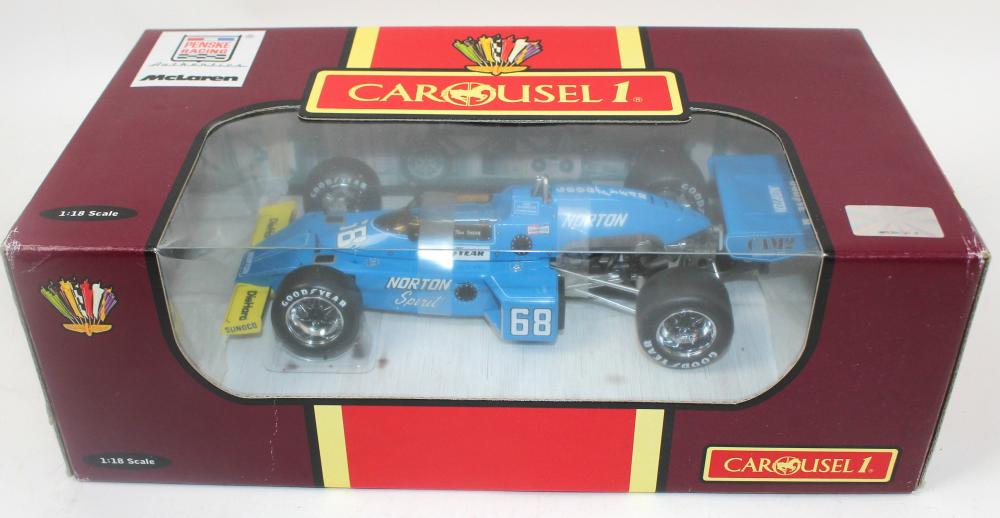 Appraisal: TOM SNEVA INDIANAPOLIS MCLAREN M CAROUSEL DIECAST Tom Sneva Indianapolis