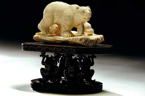 Appraisal: CARVED FOSSIL IVORY POLAR BEAR Well carved and detailed charming