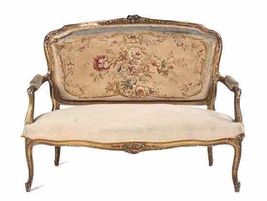 Appraisal: A Louis XV Giltwood Settee having a foliate carved crest