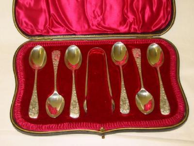 Appraisal: A SET OF SIX EDWARDIAN TEASPOONS AND TONGS in Old