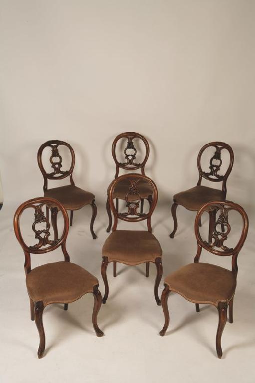 Appraisal: A SET OF SIX VICTORIAN WALNUT BALLOON-BACK DINING CHAIRS the