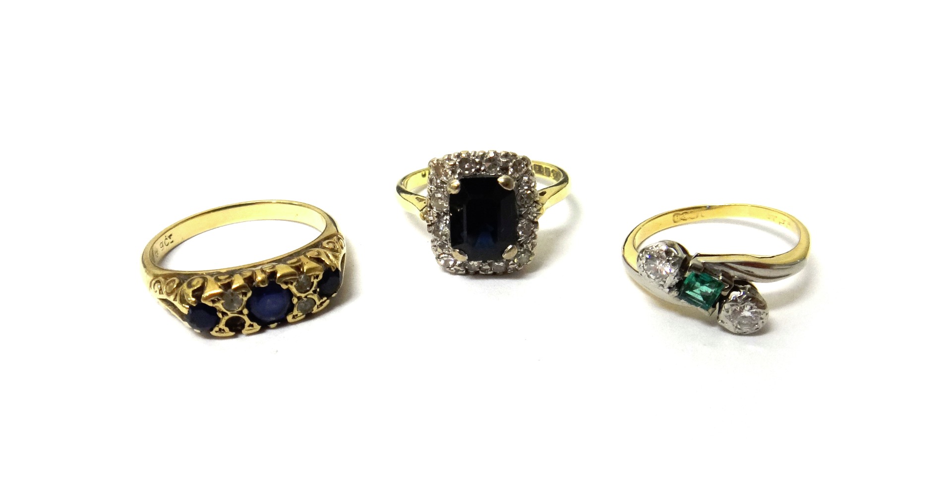 Appraisal: An ct gold sapphire and diamond set rectangular cluster ring