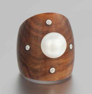 Appraisal: A Carved Mahogany Pearl and Diamond Ring Carved mahogany ring