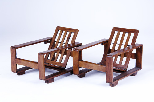 Appraisal: JEAN ROYERE Pair of reclining child's chairs with hinged seat