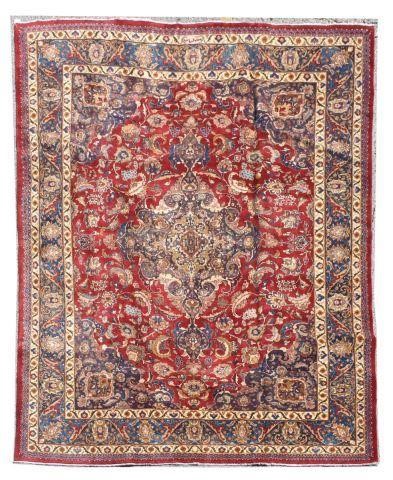 Appraisal: Hand-tied Persian Mashad rug approx ' l ' w