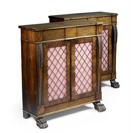 Appraisal: A pair of Regency rosewood and brass mounted side cabinets