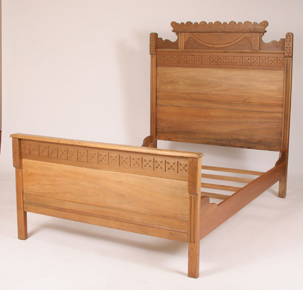 Appraisal: Victorian Eastlake-style bedroom set with chip carved fan pattern hotel