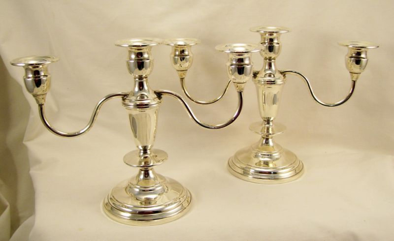 Appraisal: Pair Sterling Triple Candleholders Sterling weighted bases measures high and