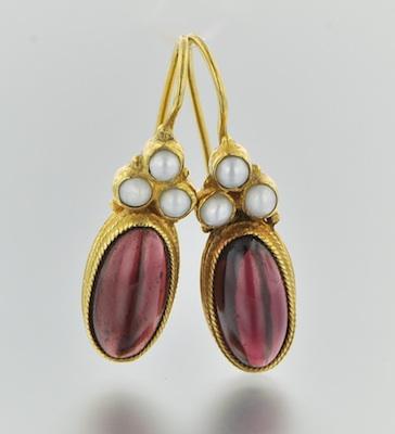 Appraisal: A Pair of Garnet and Pearl Earrings k yellow gold