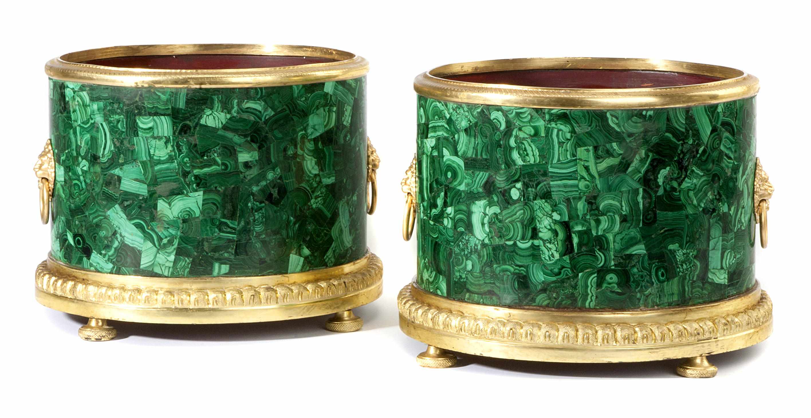 Appraisal: A pair of Neoclassical style gilt bronze mounted malachite veneered