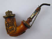 Appraisal: A German meerschaum pipe the bowl carved as a wolf