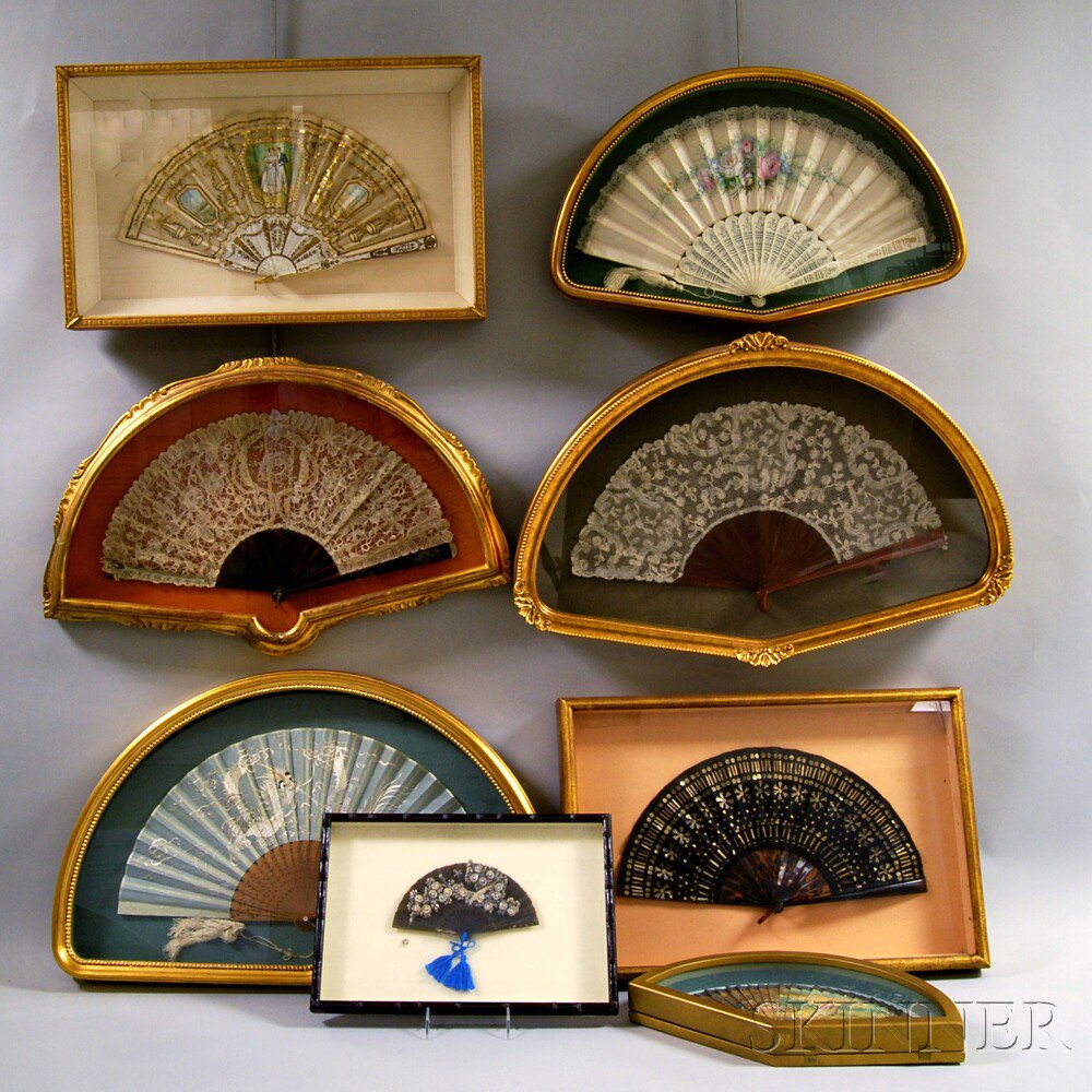 Appraisal: Eight Framed Carved and Painted Fans including one with a