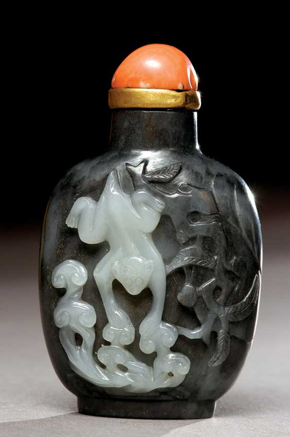 Appraisal: SUZHOU-TYPE SNUFF BOTTLE Finely carved black jade Suzhou School-type snuff