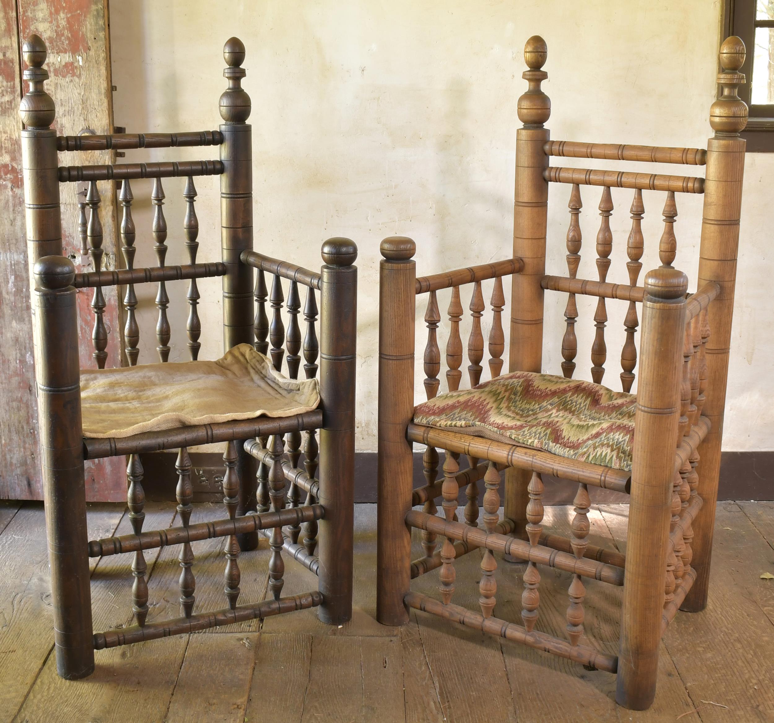 Appraisal: TWO ANTIQUE OAK BREWSTER CHAIRS Ca chairs with finial tops