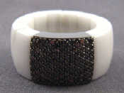 Appraisal: A white ceramic carat gold and black diamond ring signed