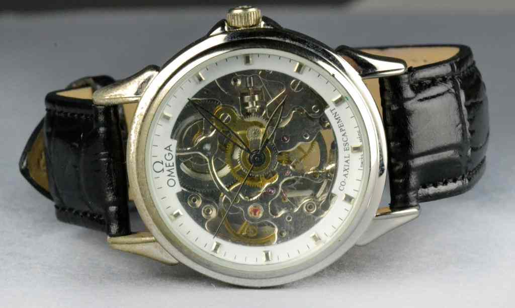 Appraisal: Omega Mens Skeletal WristwatchSkeletal watch with visible movements co-axial escapement