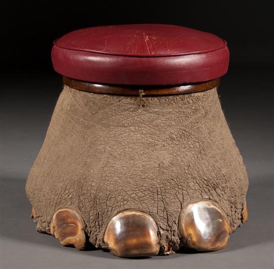 Appraisal: Elephant foot stool with wood compartment and leather seat in