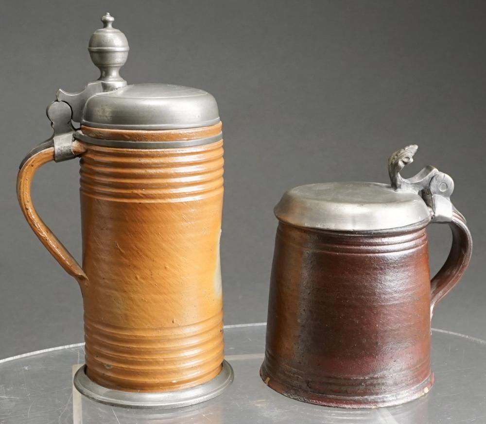 Appraisal: Two Continental Pewter Mounted Stoneware Steins H of tallest in