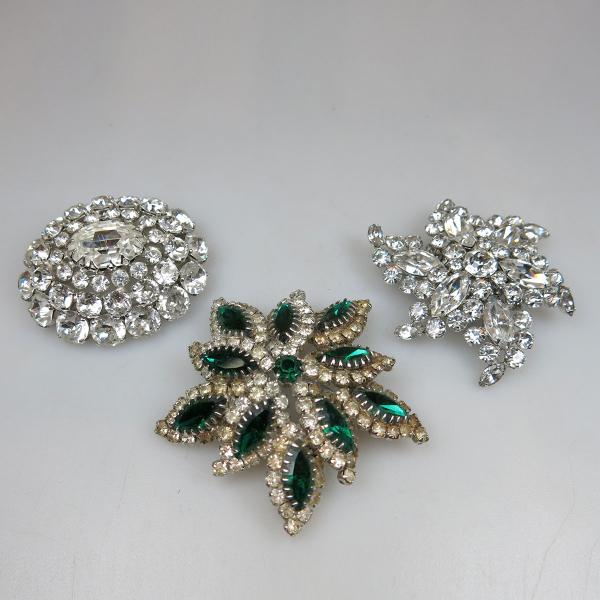 Appraisal: Three Sherman Silver Tone Metal Brooches set with clear and