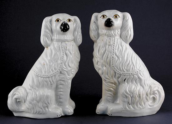 Appraisal: Pair Staffordshire earthenware figures of dogs th centuryH Provenance Collection