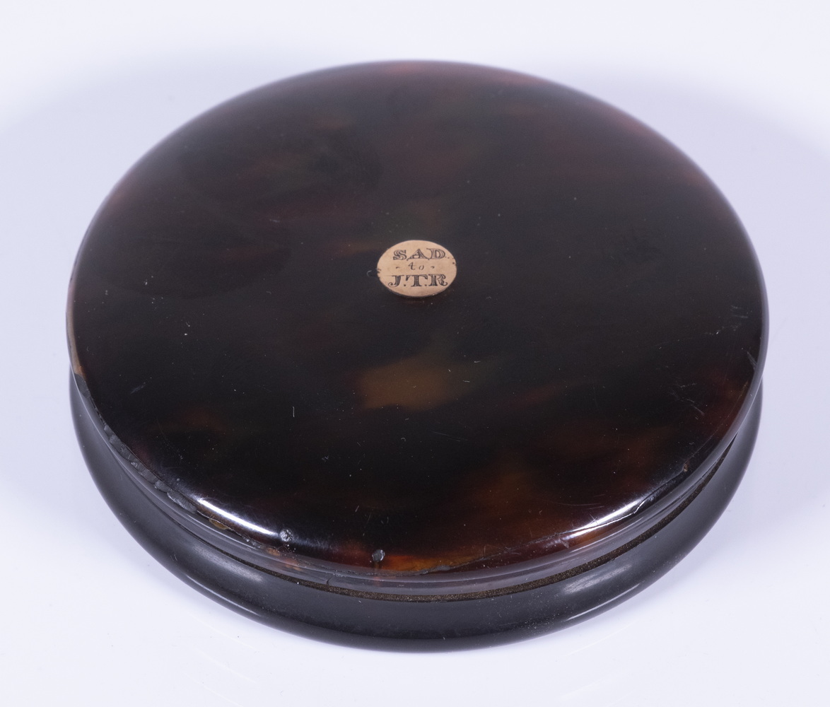 Appraisal: TH C ROUND CARVED TORTOISESHELL BOX WITH GOLD BUTTON Shallow