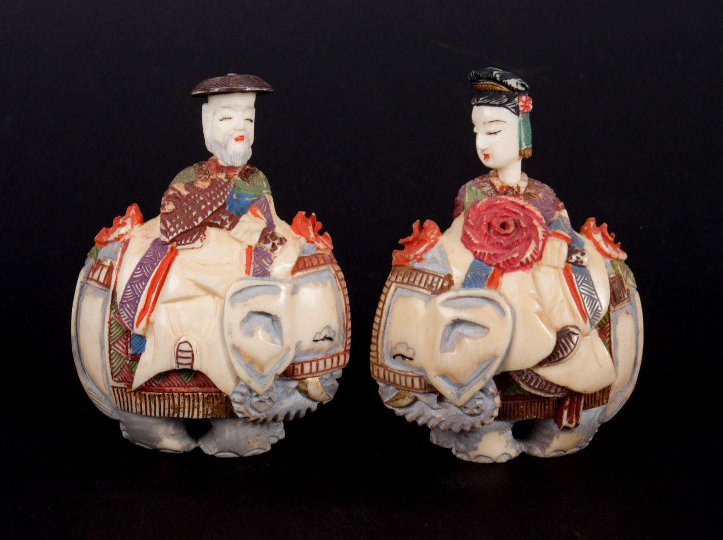 Appraisal: Pair of Japanese carved ivory snuff bottles each modeled as