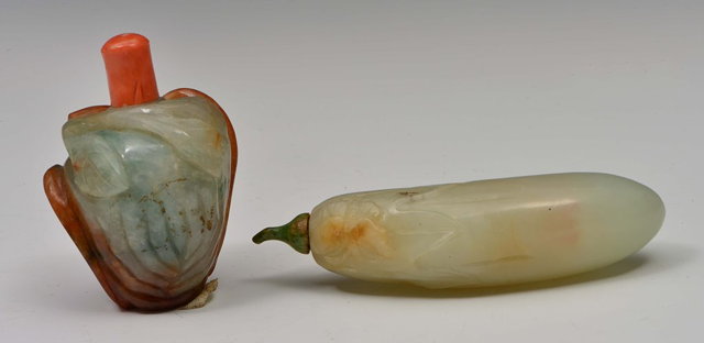 Appraisal: A CHINESE MUTTON FAT JADE SNUFF BOTTLE carved as an