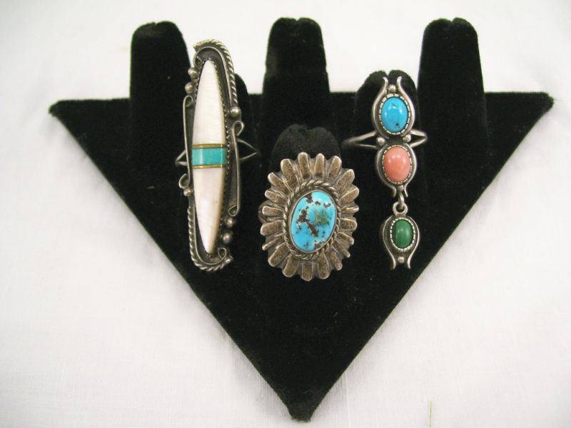 Appraisal: - Sterling Rings Includes Sterling and turquoise center stone ring