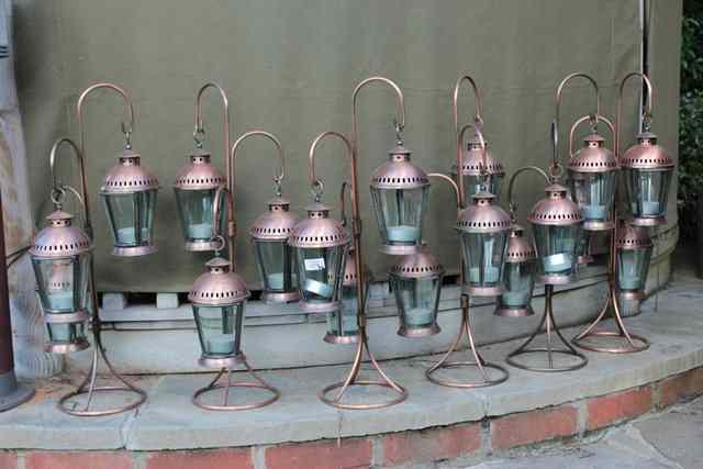 Appraisal: A SET OF SIX THREE LIGHT TABLE TOP COPPERED CANDLE