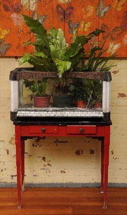 Appraisal: VICTORIAN CAST-STONE WHITE SLAG GLASS TILE AND GLASS TERRARIUM Together