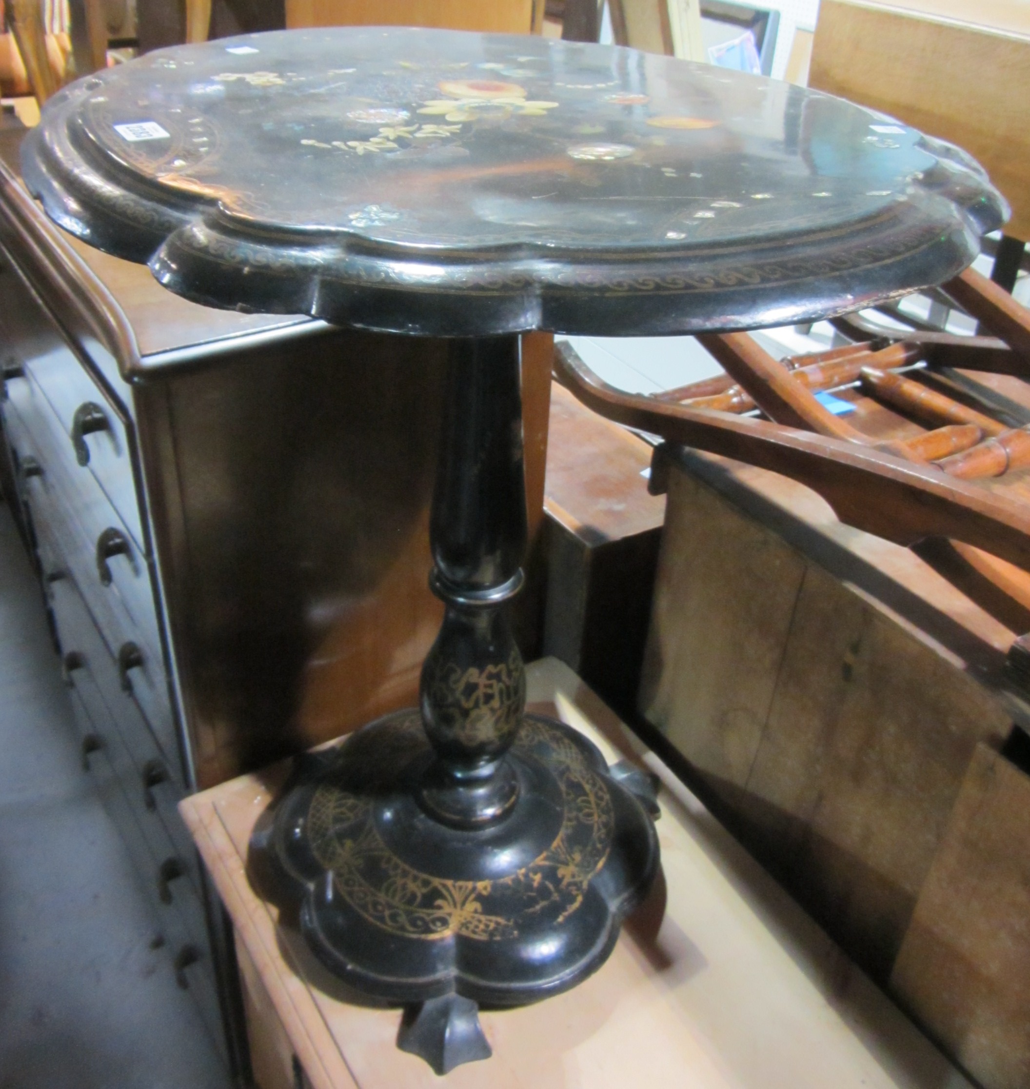 Appraisal: A Victorian black lacquer papier mache occasional table with inlaid