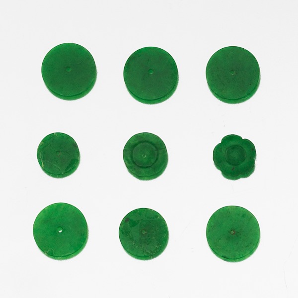 Appraisal: NINE UNMOUNTED APPLE GREEN JADEITE JADE DISCS Nine carved unmounted