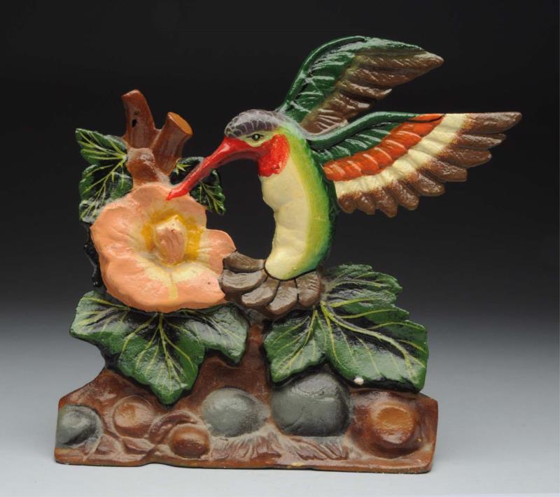 Appraisal: Cast Iron Hummingbird Doorstop Depicts flying hummingbird in flight getting