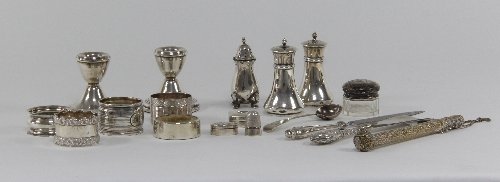 Appraisal: Sundry small silver including pepper pots desk candlesticks napkin rings