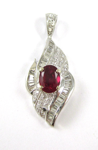 Appraisal: SYNTHETIC RUBY AND DIAMOND PENDANT k white gold with round-cut